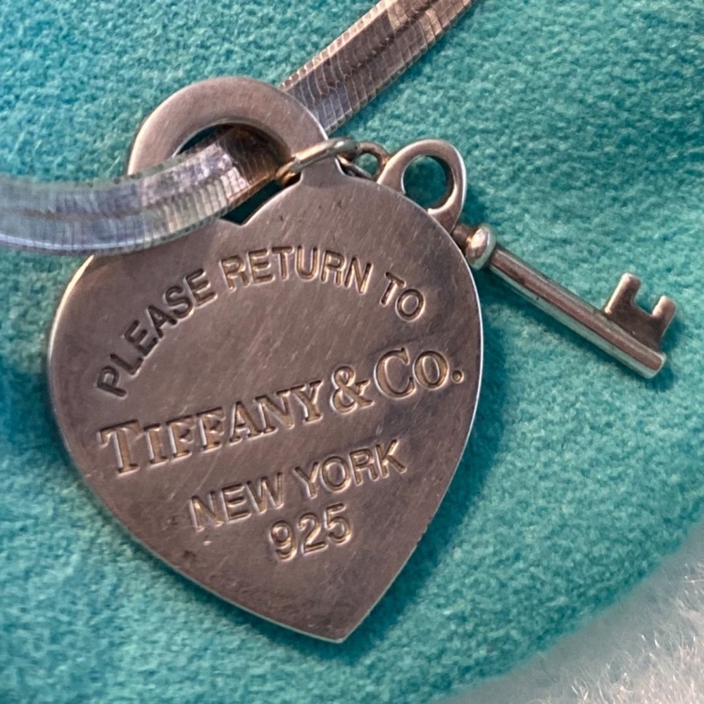 Tiffany & Co. Silver Heart Tag Necklace with Key Charm on Blue Pouch